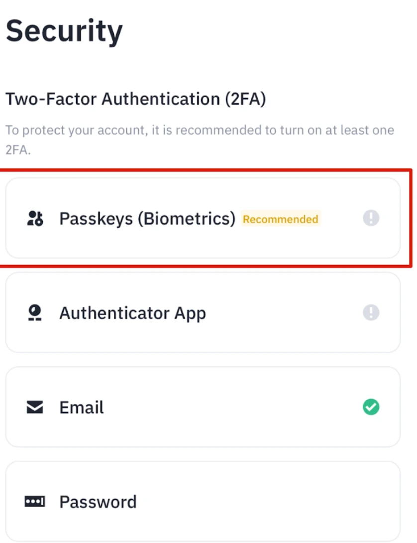 Binance-ის აპის Security გვერდი, სადაც 2FA-ის სიაში წითლად შემოხაზულია Passkeys (Biometrics) ნიშნით Recommended, ქვემოთ კი Authenticator App, Email და Password
