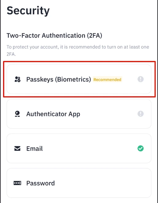 Ekran Security w aplikacji Binance z zaznaczoną pozycją Passkeys (Biometrics) oznaczoną jako Recommended, poniżej Authenticator App, Email i Password